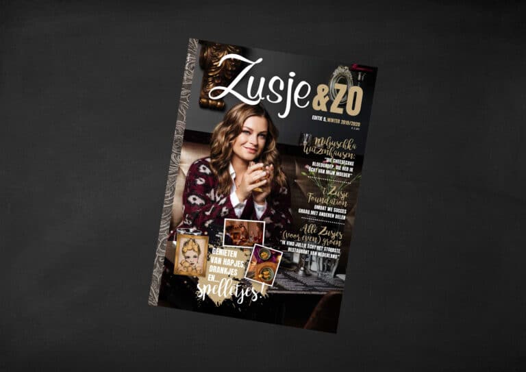 Tijdschrift T zusje & zo met goude en zwarte elementen. En zwarte achtergrond.